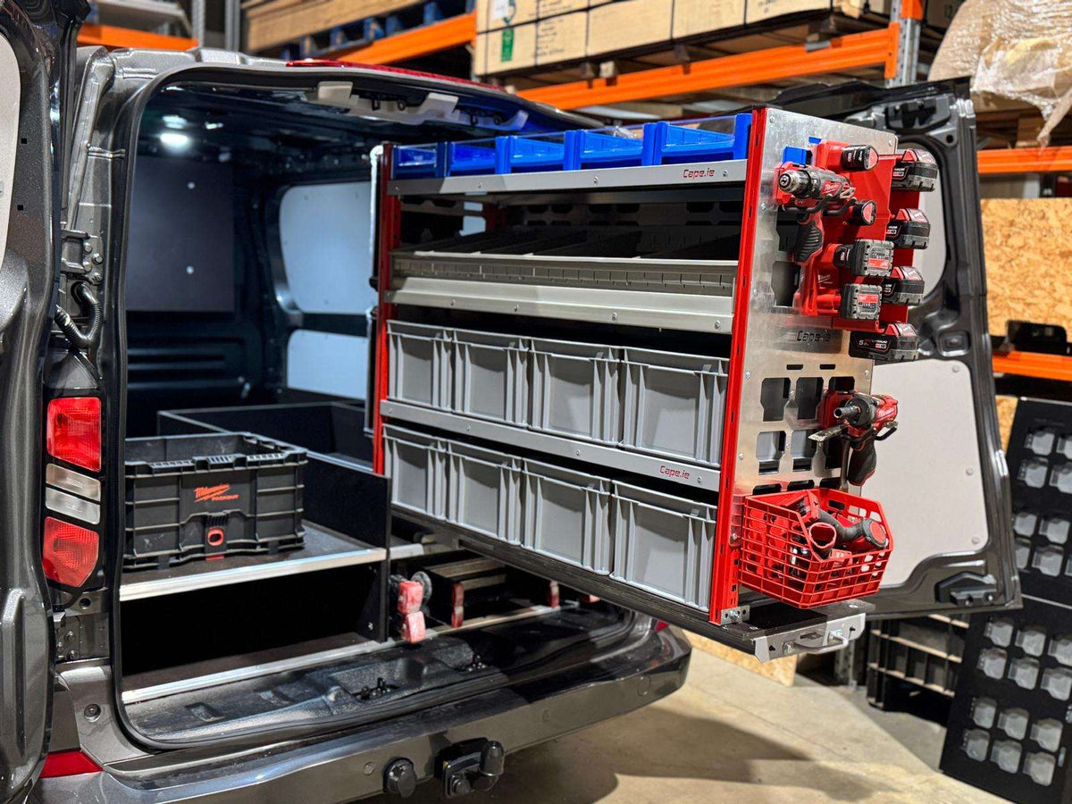 Picture of a Milwaukee Packout Pull Out Shelving Unit in a Van with Selections of Blue Shelf Bins and Grey Euro Boxes, a Bin Kit and Milwaukee Packout Accessories Clipped onto the Milwaukee Packout Gable.