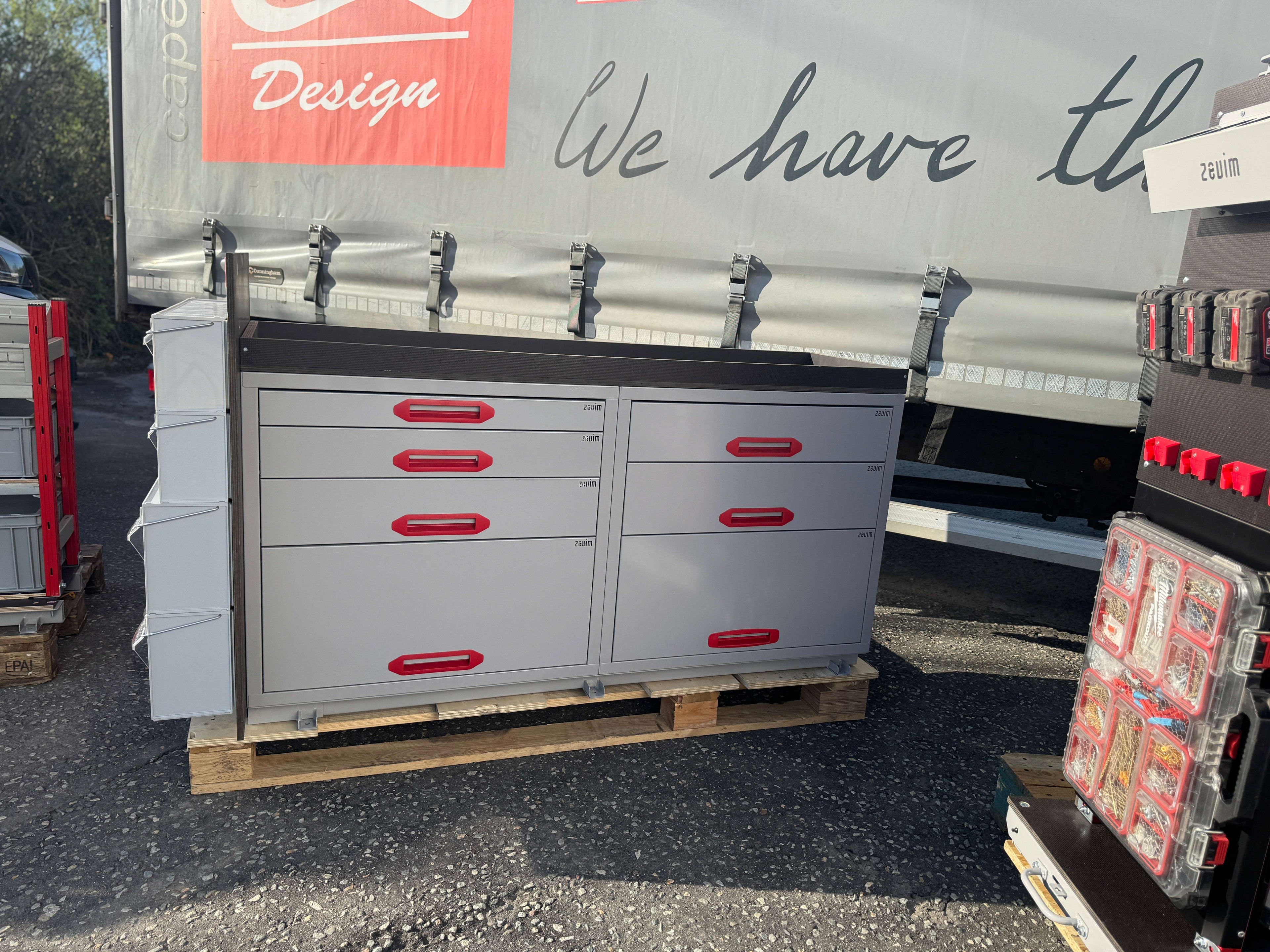 Picture of a Drawer Cabinet Pull Out Unit with a Stack of MB Boxes Fixed onto the Back