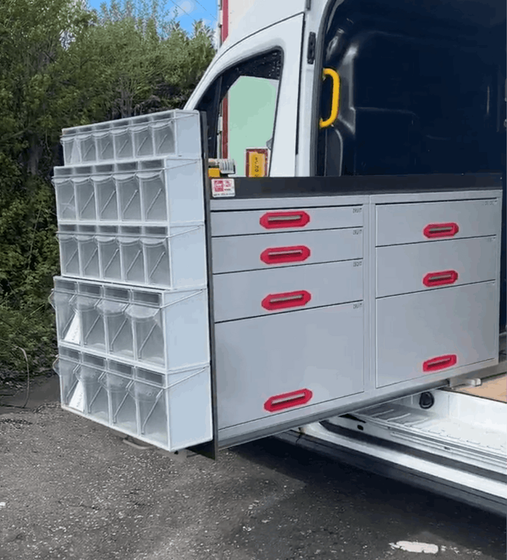 Picture of a Drawer Cabinet Pull Out Unit in a Van with a Stack of MB Boxes fixed to the Back