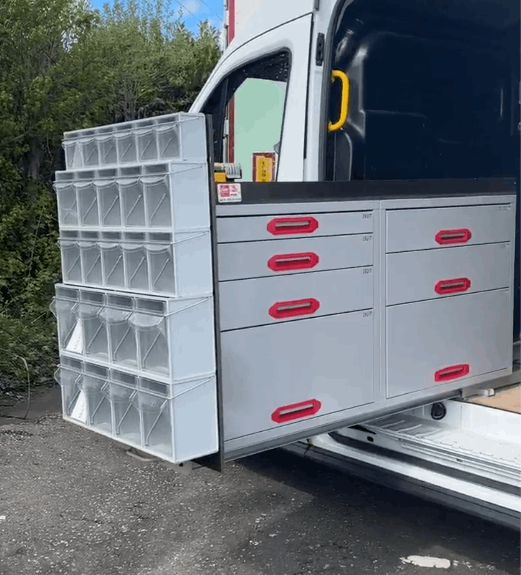 Picture of a Drawer Cabinet Pull Out Unit in a Van with a Stack of MB Boxes fixed to the Back