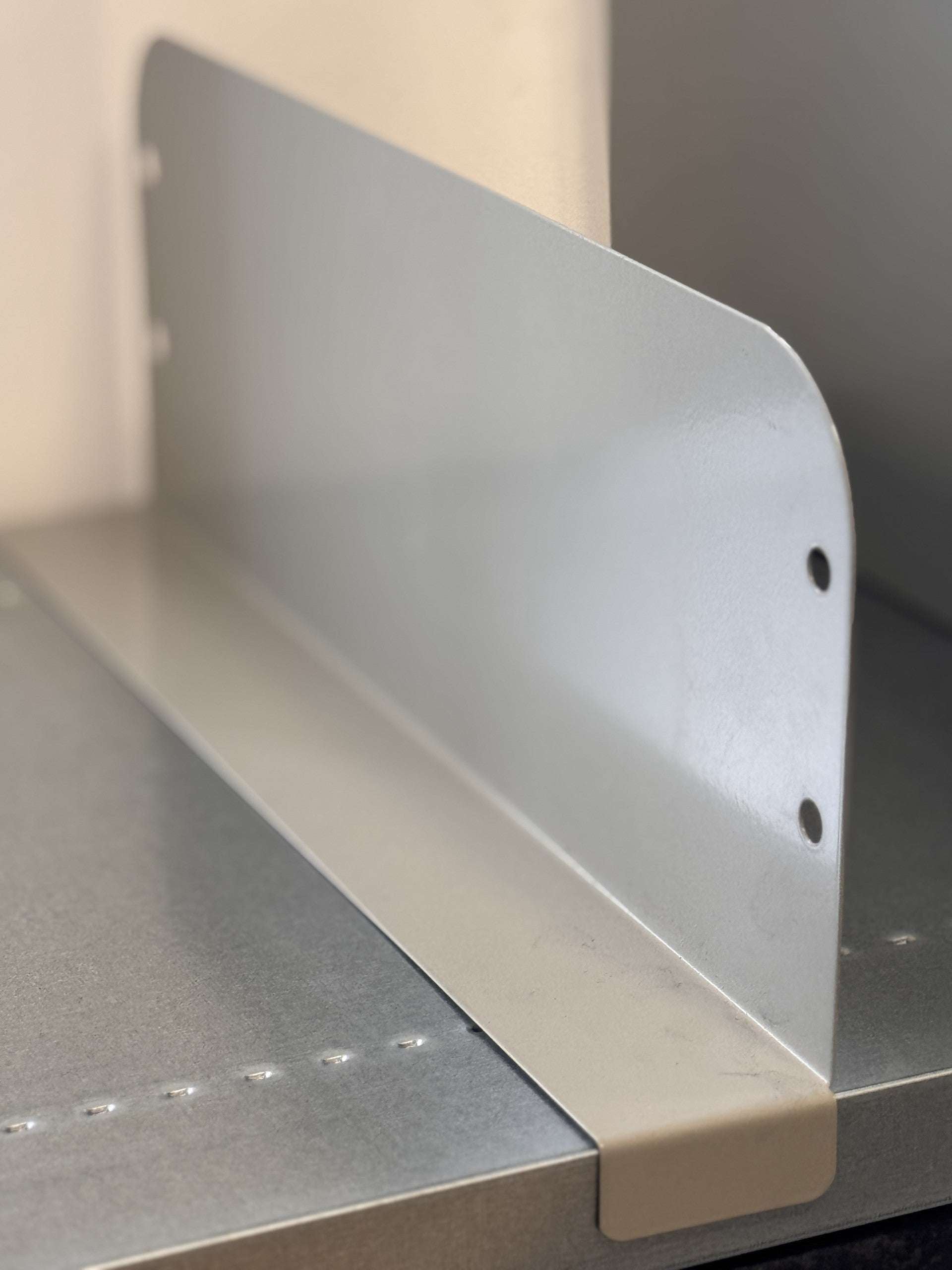 Image of a ST30 Shelf Divider sitting on a ST30 Shelf